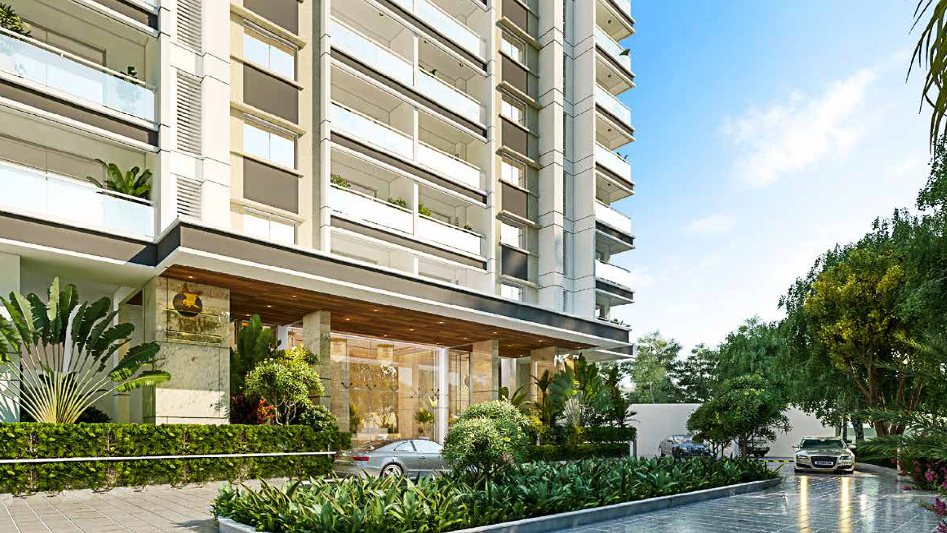 Ground-level photograph of the completed entrance and residential tower at Prestige Eden Garden.